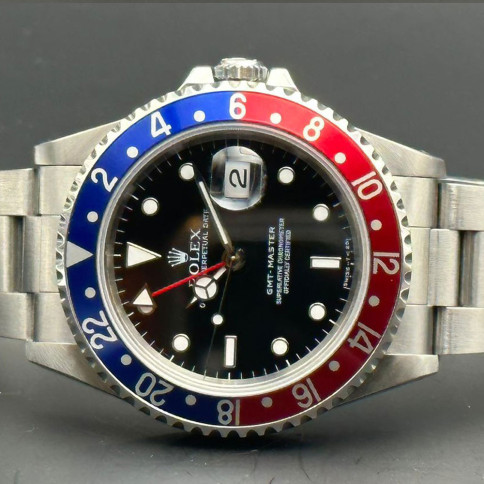 Rolex GMT-Master 16700 watch and paper 1997